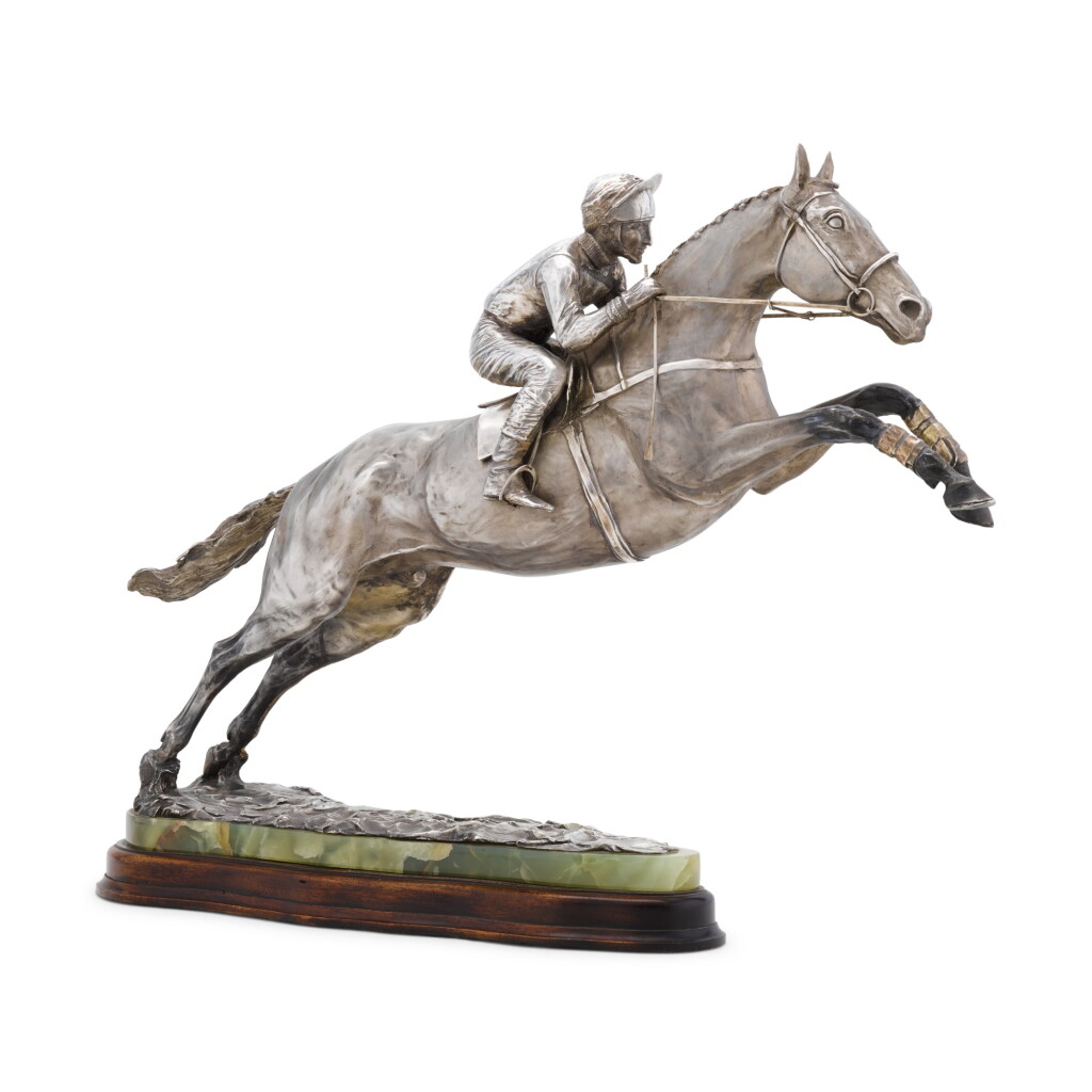 View full screen - View 1 of Lot 13. A silver sculpture of Desert Orchid, Garrard & Co. Ltd., London, 1990, modelled by Edwina Emery.