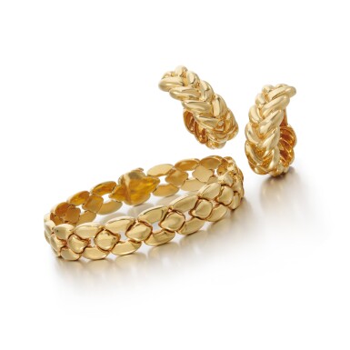 View full screen - View 1 of Lot 186. Pair of gold earrings and a bracelet, Cartier.
