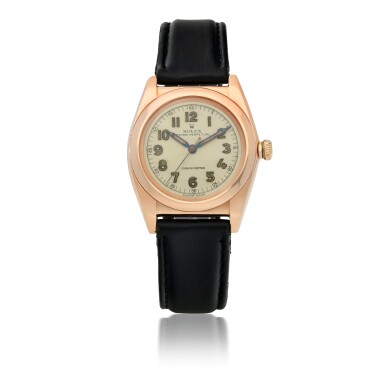 View full screen - View 1 of Lot 556. ROLEX | 'BUBBLEBACK', REF 3131 PINK GOLD WRISTWATCH CIRCA 1946.