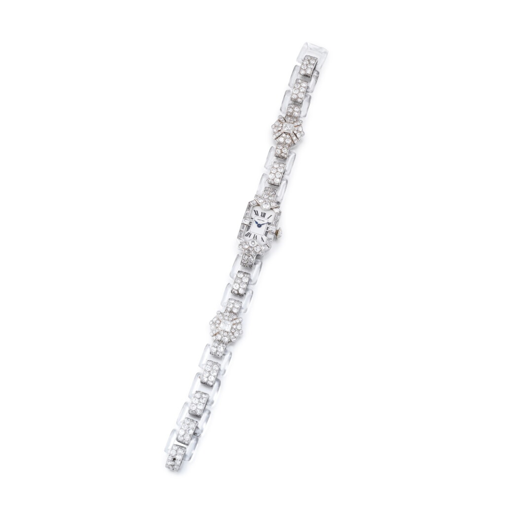 View full screen - View 1 of Lot 69. Montre bracelet de dame cristal de roche et diamants | Lady's rock crystal and diamond bracelet watch.