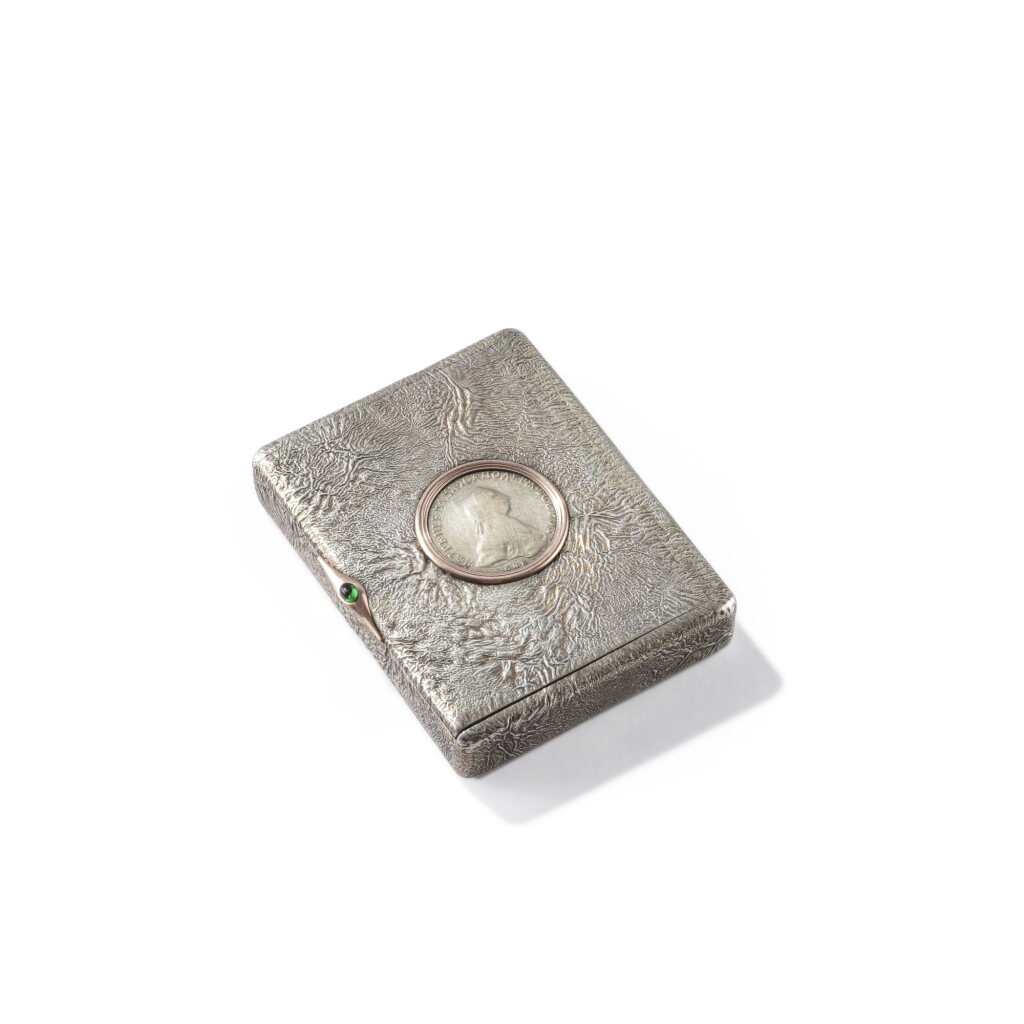 View full screen - View 1 of Lot 747. A Fabergé gem-set silver samorodok cigarette case, workmaster Anders (Antti) Nevalainen, St Petersburg, 1899-1908.