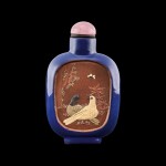 A blue-ground Yixing stoneware 'Pekingese dogs and pigeons' snuff bottle, Qing dynasty, Daoguang period | 清道光 宜興紫砂堆料加彩雙犬圖鼻煙壺