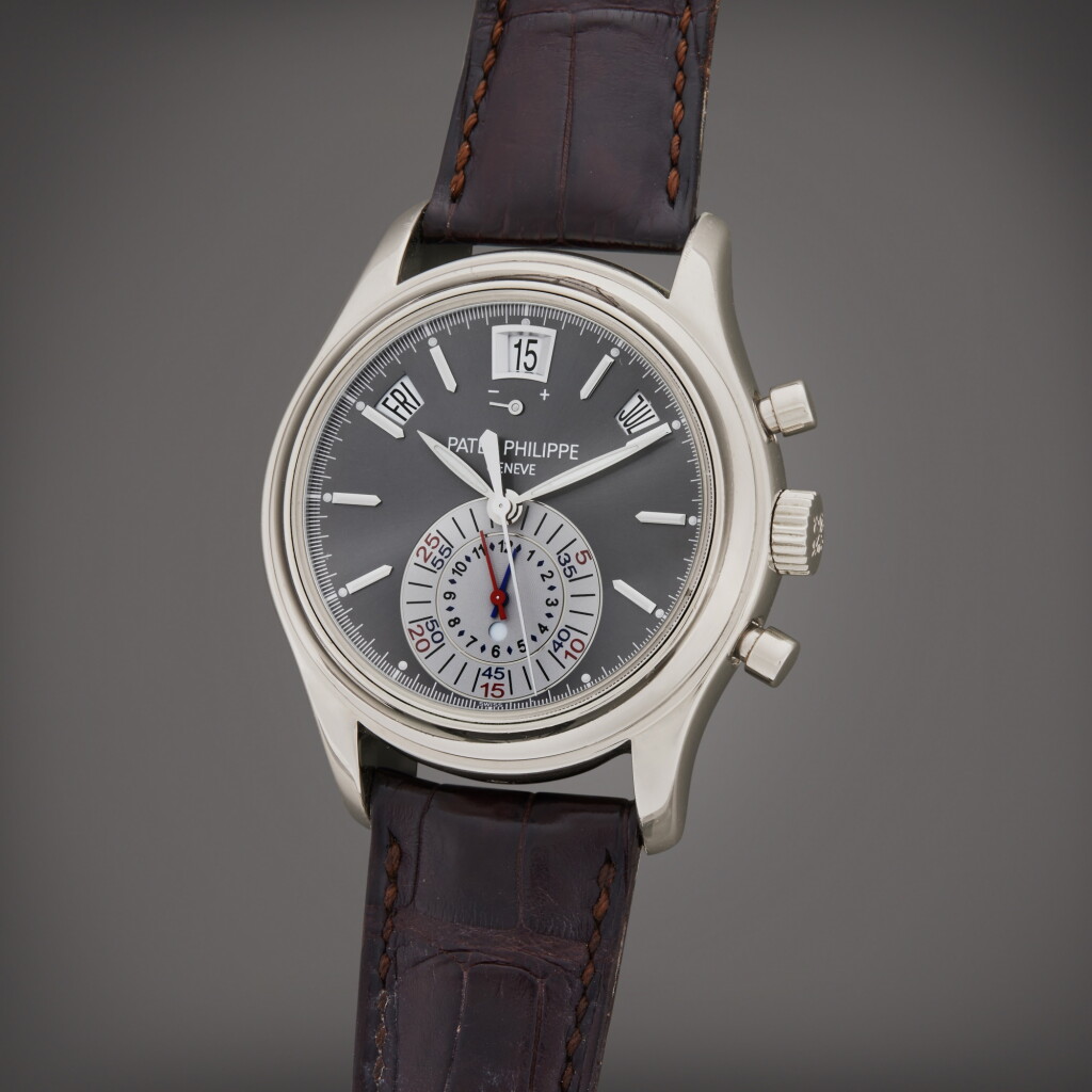 View full screen - View 1 of Lot 10. Reference 5960P-001 | A platinum automatic annual calendar flyback chronograph wristwatch with power reserve and day/night indication, Circa 2007.