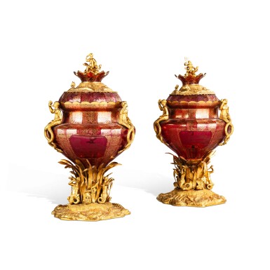 View full screen - View 1 of Lot 100. A pair of Bohemian gilt-metal mounted glass vases with views of Dresden, late 19th century | Paire de vases couverts en verre de Bohème et monture de métal doré, fin XIXe siècle.