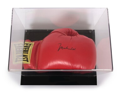 View full screen - View 1 of Lot 109. Muhammad Ali Signed Boxing Glove in Plexiglas case.