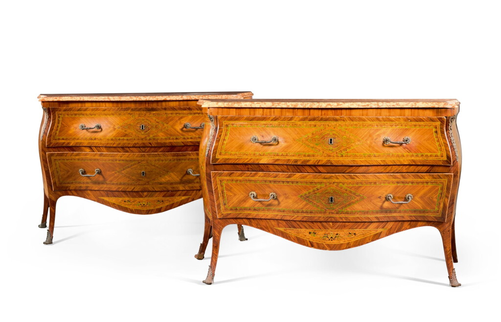 View full screen - View 1 of Lot 89. A pair of South Italian rosewood and kingwood marquetry commodes, Naples, circa 1760 | Paire de commodes en placage de bois de rose et bois de violette, Italie du sud, Naples, vers 1760.