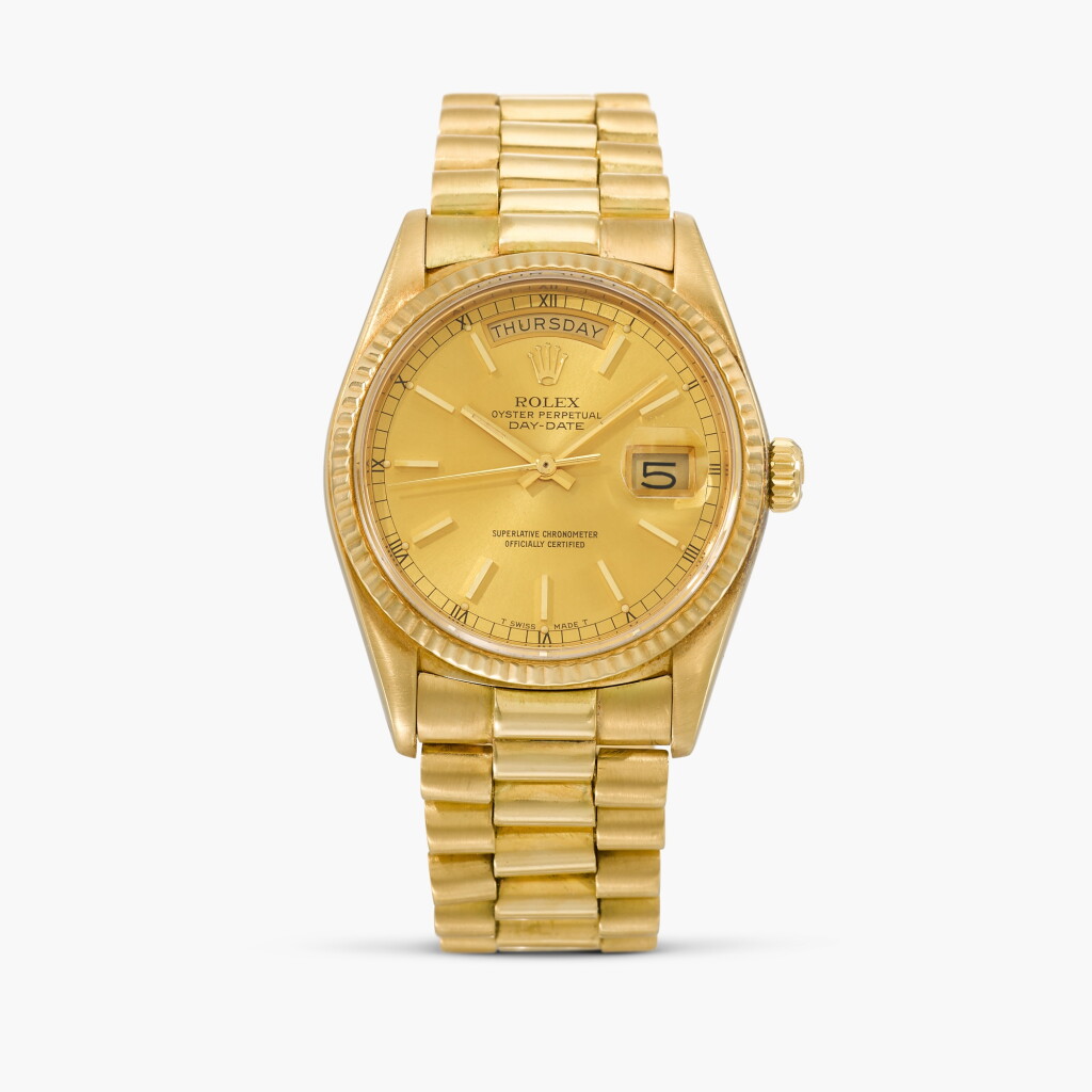 View full screen - View 1 of Lot 42. Day-Date, Reference 18038 | A yellow gold wristwatch with day, date and bracelet | Circa 1984.