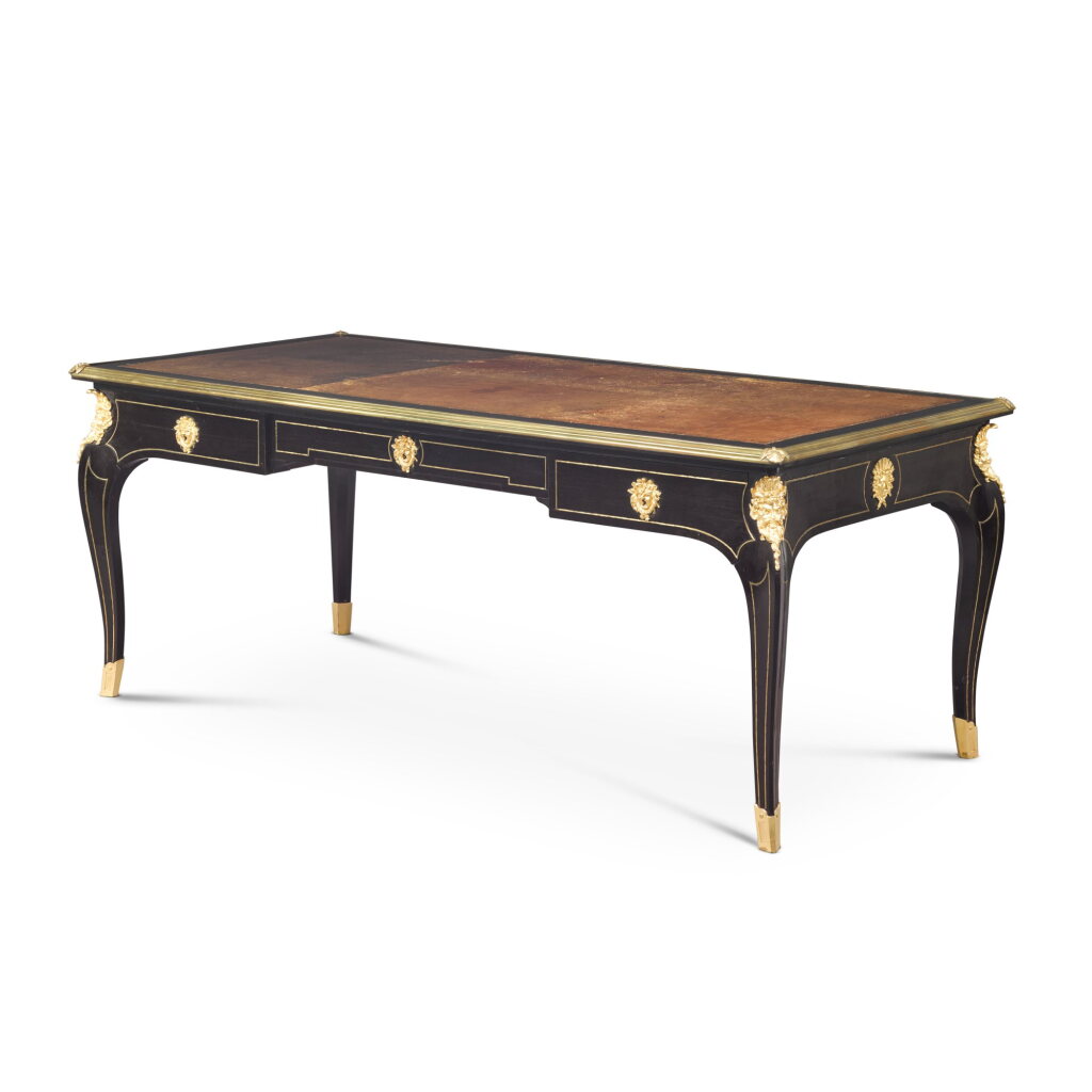View full screen - View 1 of Lot 108. A French gilt-bronze mounted ebony bureau plat, by Guillaume Edmond Lexcellent, Paris, circa 1860.