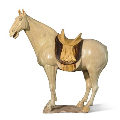 View full screen - View 1 of Lot 202. A magnificent and massive sancai-glazed pottery figure of a horse, Tang dynasty.
