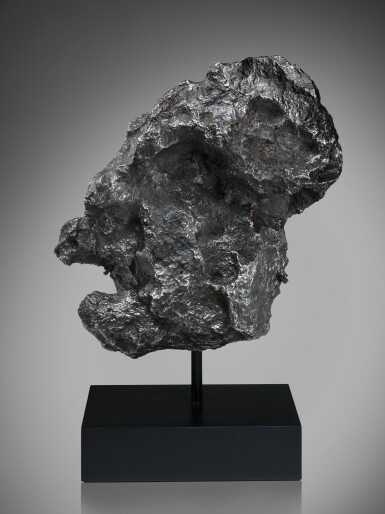 View full screen - View 1 of Lot 94. Campo Del Cielo Meteorite | Alien-Like Braincase Evoked In Campo Del Cielo Meteorite.