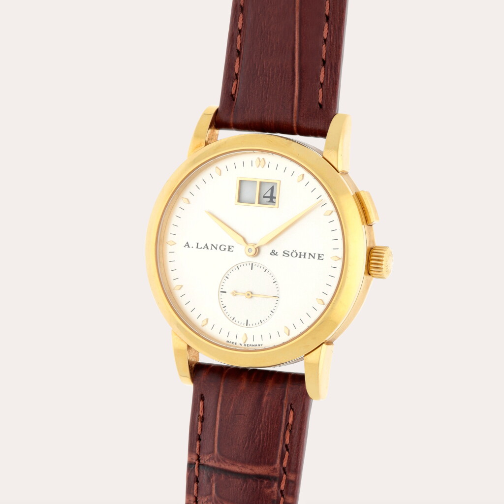 View full screen - View 1 of Lot 260. Saxonia, Referene 105.021 | A yellow gold wristwatch with digital date display | Circa 2002.