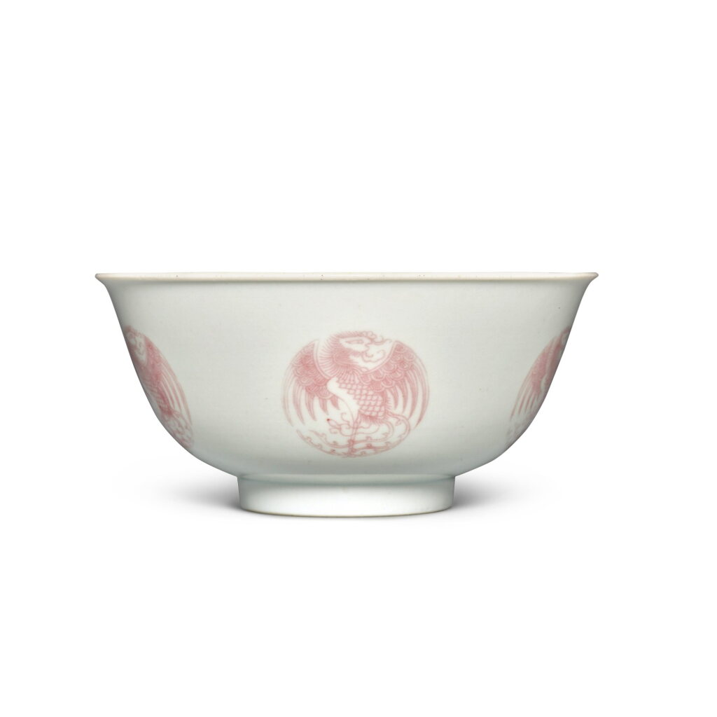View full screen - View 1 of Lot 372. A copper-red 'phoenix medallion' bowl, Seal mark and period of Daoguang | 清道光 釉裏紅團鳳紋盌 《大清道光年製》款.