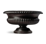 A Regency carved Ashford black marble vase, circa 1820