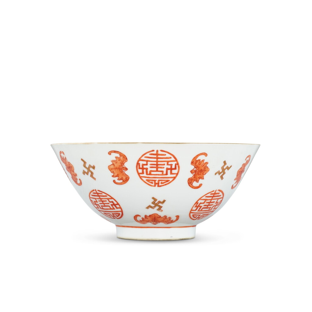 View full screen - View 1 of Lot 3399. An iron-red and gilt-decorated 'bat and longevity' bowl, Mark and period of Tongzhi | 清同治 礬紅彩描金福壽紋盌 《大清同治年製》款.