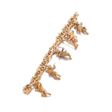 View full screen - View 1 of Lot 883. Gold charm bracelet.