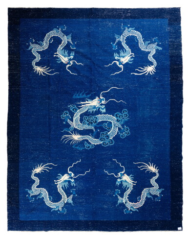 View full screen - View 1 of Lot 180. An impressive blue-ground 'five dragons' carpet, 20th century | 二十世紀 藍地黃龍紋地毯.