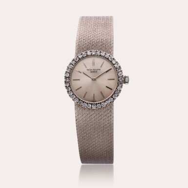 View full screen - View 1 of Lot 453. Reference 3355/1 | A white gold and diamond-set bracelet watch, Circa 1968.