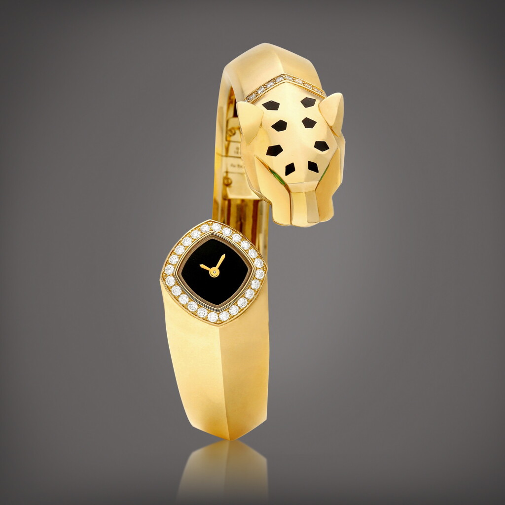 View full screen - View 1 of Lot 744. La Panthère, Reference HPI01342 | A yellow gold, diamond and tsavorite garnet-set bangle watch, Circa 2015 | 卡地亞 | La Panthère 型號HPI01342 | 黃金鑲鑽石及沙弗萊石手鐲腕錶,約2015年製.