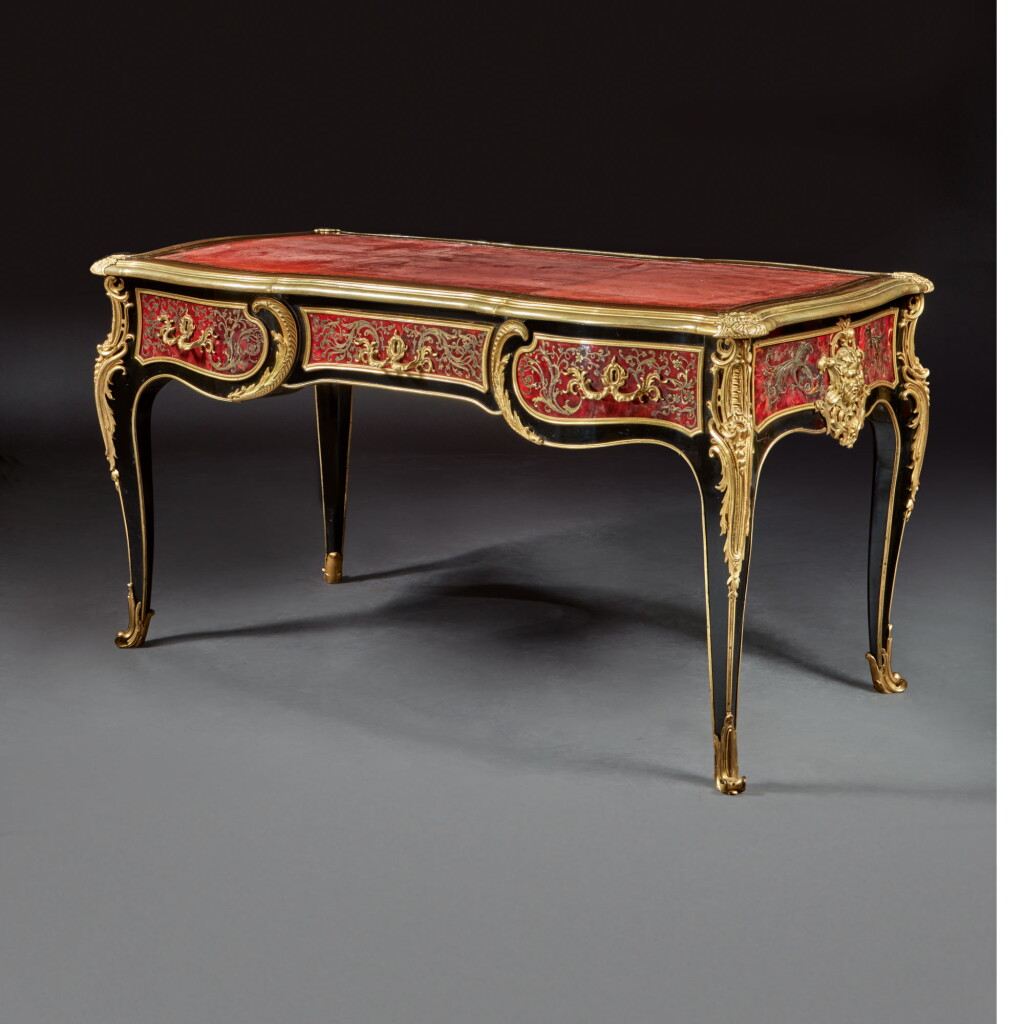 View full screen - View 1 of Lot 150. A LOUIS XV GILT BRONZE -MOUNTED EBONIZED WALNUT AND RED TORTOISESHELL AND BRASS PREMIERE PARTIE BOULLE MARQUETRY BUREAU PLAT BY LATZ, SIGNED AND DATED 1744, THE MARQUETRY SECOND QUARTER 19TH CENTURY, LIKELY REPLACING AN EARLIER SIMILAR DESIGN.