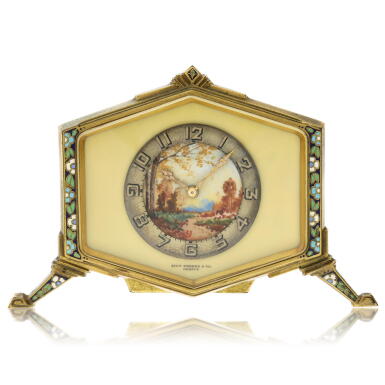 View full screen - View 1 of Lot 176. Retailed by Zivy Frères & Co.: An gilt and polychrome 8-day hexagonal desk clock, Circa 1925.