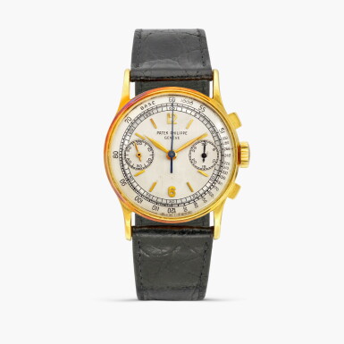 View full screen - View 1 of Lot 2374. Reference 130 | A yellow gold chronograph wristwatch with two-tone dial, Made in 1949.