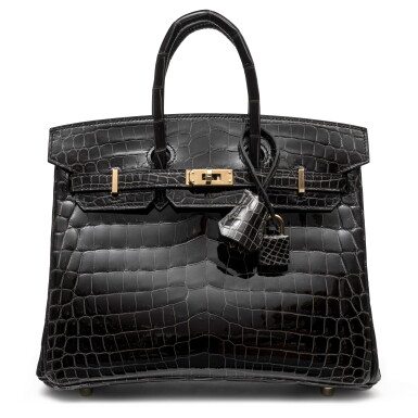 View full screen - View 1 of Lot 1028. Graphite Shiny Niloticus Crocodile Birkin 25 Gold Hardware, 2022.