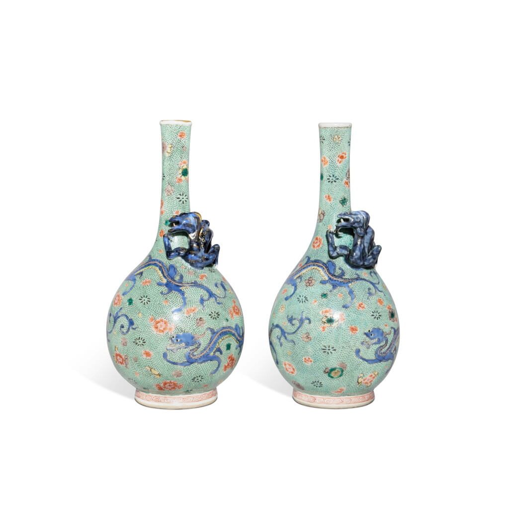 View full screen - View 1 of Lot 581. A pair of pale-green-ground relief-decorated famille-verte 'chilong' bottle vases, Qing dynasty, Kangxi period | 清康熙 綠地五彩螭龍紋長頸瓶一對.