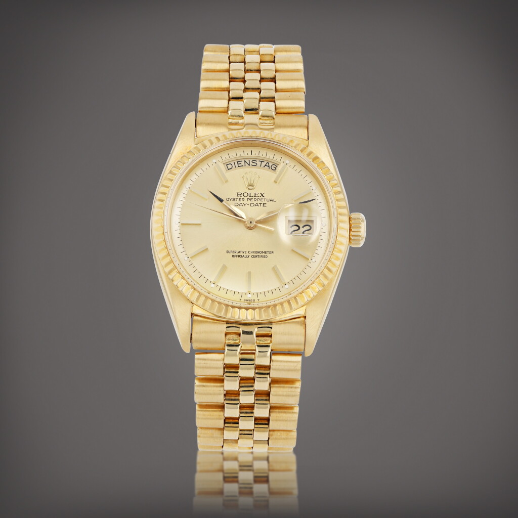 View full screen - View 1 of Lot 136. Day-Date, reference 1803 Montre bracelet en or jaune avec jour et date | Yellow gold wristwatch with day, date and bracelet Vers 1962 | Circa 1962.