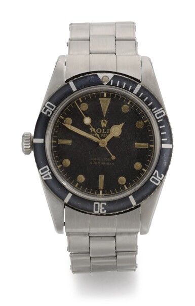 View full screen - View 1 of Lot 64. ROLEX | SUBMARINER, REFERENCE 6536/1, LEFT-HANDED STAINLESS STEEL WRISTWATCH WITH BRACELET, CIRCA 1956.