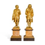 A pair of Restauration style gilt and patinated bronze figures of Voltaire and Rousseau, after models by Jean-Claude Rosset