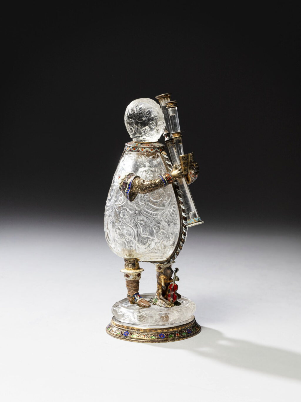 View full screen - View 1 of Lot 160. An enamelled silver-gilt rock crystal figural flask, unmarked, probably Austrian, circa 1880.