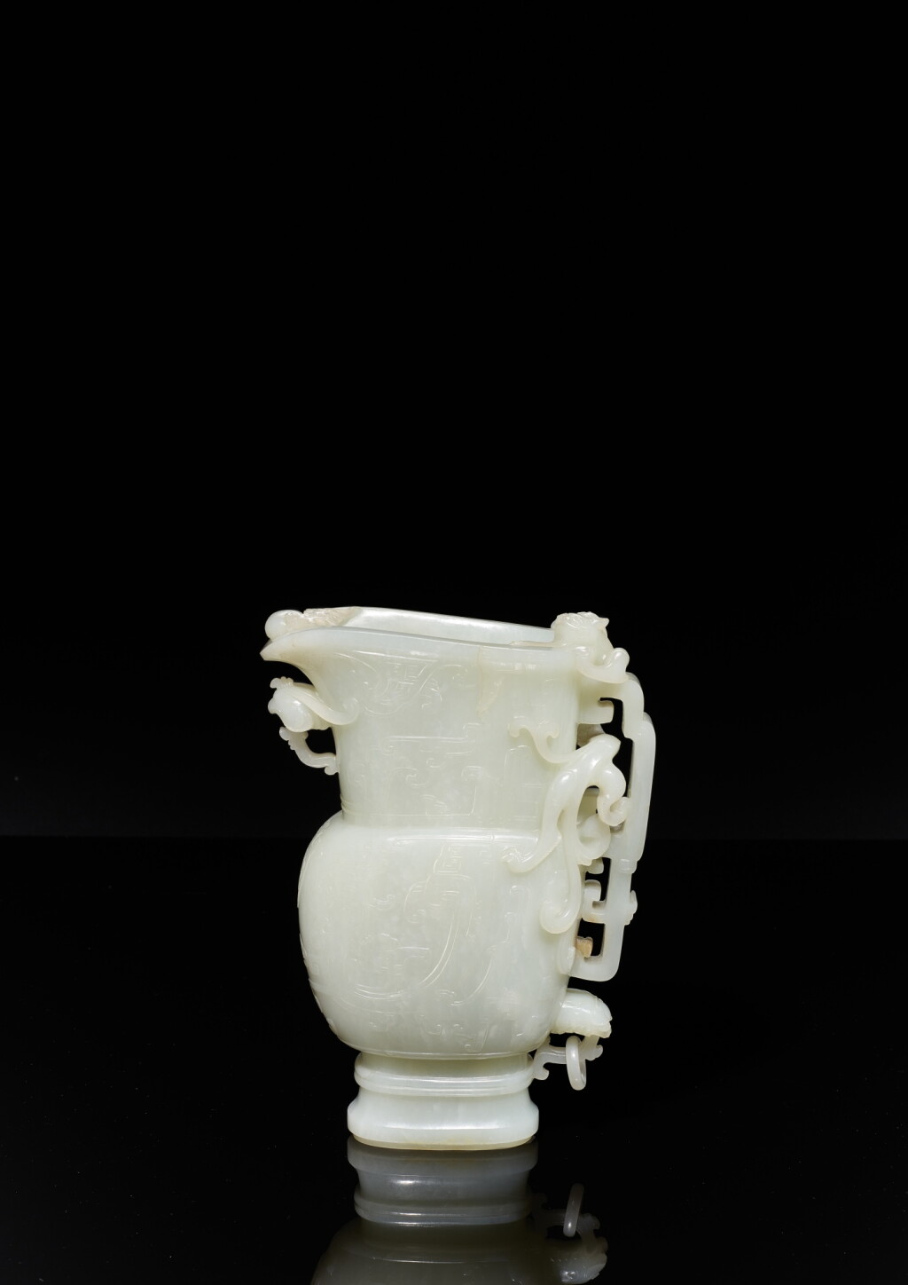 View full screen - View 1 of Lot 3639. A white jade archaistic 'chilong' vessel, gong, Qing dynasty, Qianlong period | 清乾隆 白玉螭龍觥.