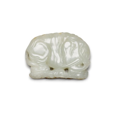 View full screen - View 1 of Lot 135. A pale celadon and russet jade elephant, Song – Yuan dynasty | 宋至元 青白玉瑞象.