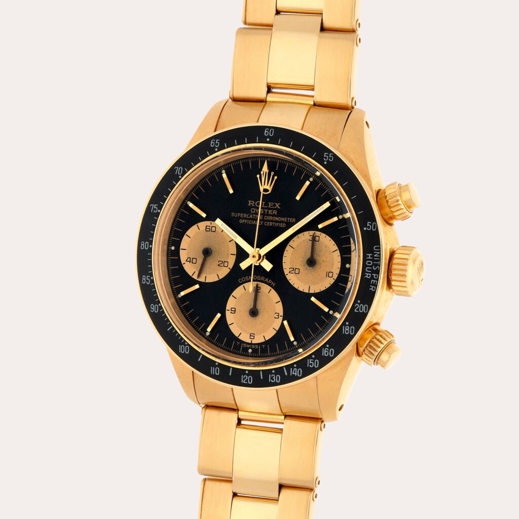 View full screen - View 1 of Lot 114. Daytona, Reference 6263 | A yellow gold chronograph wristwatch with bracelet | Circa 1979.
