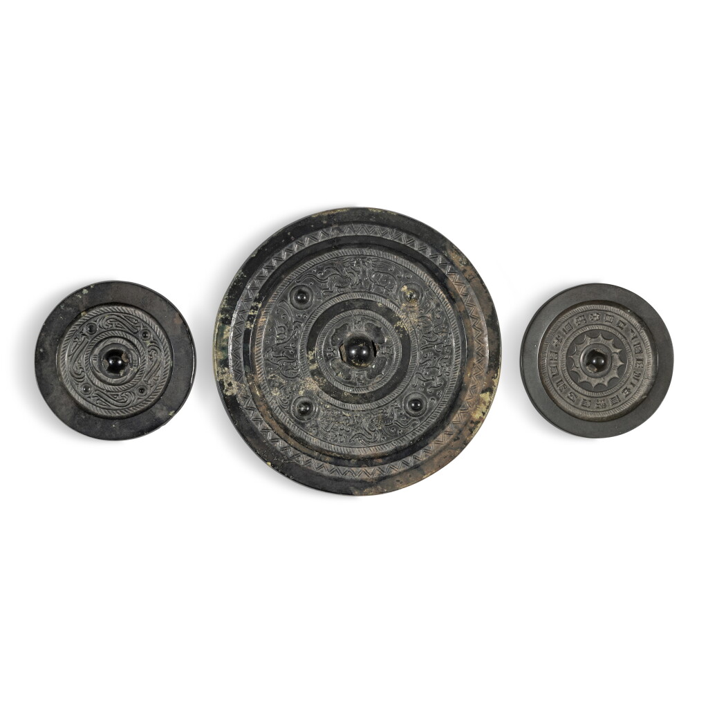 View full screen - View 1 of Lot 60. A group of three bronze mirrors, Han dynasty | 漢 銅鏡一組三件.