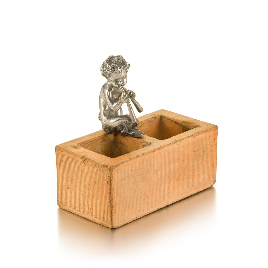 View full screen - View 1 of Lot 1038. A Fabergé silver-mounted clay brick match holder, probably Moscow, circa 1895.