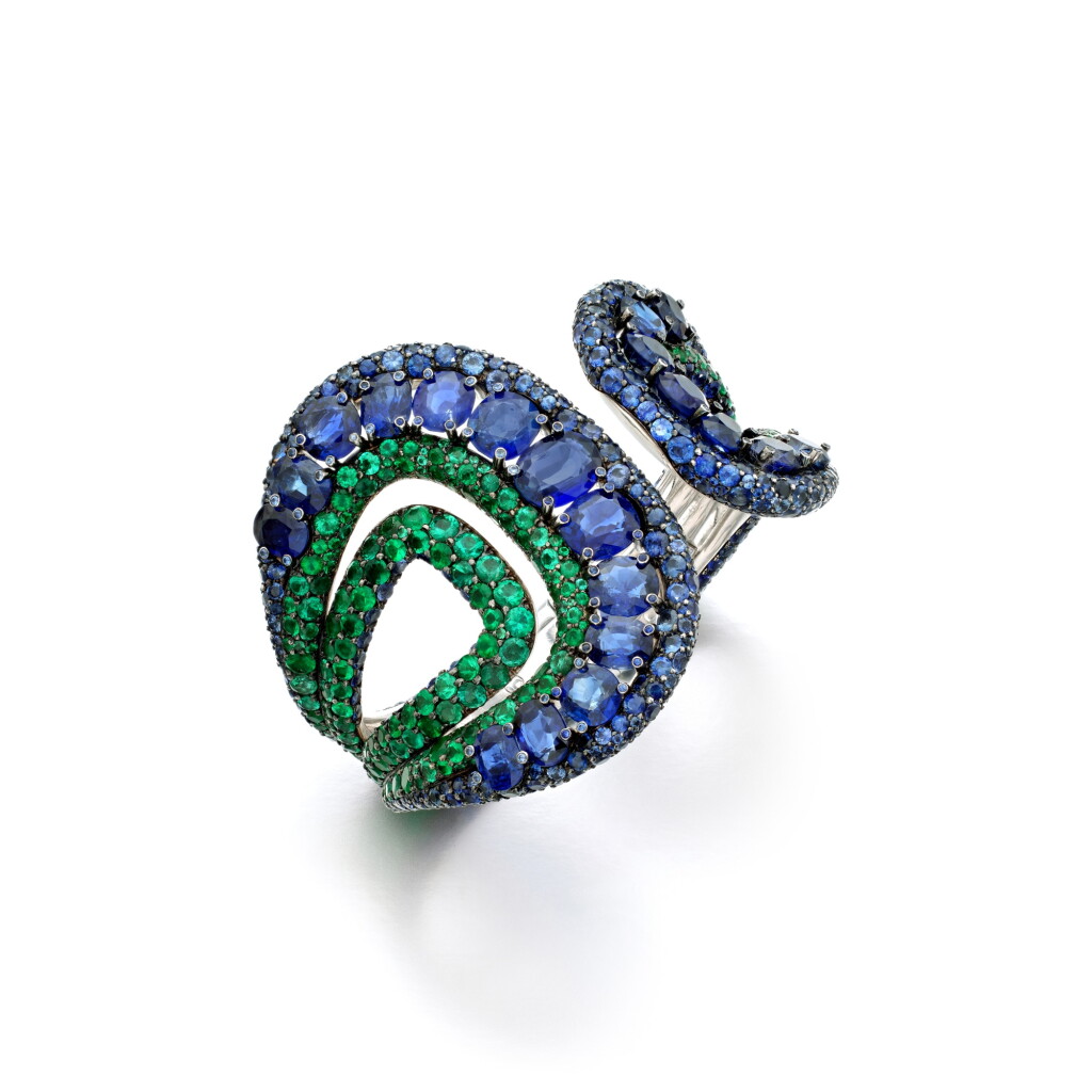 View full screen - View 1 of Lot 525. Sapphire, Emerald and Tsavorite Garnet Bangle.