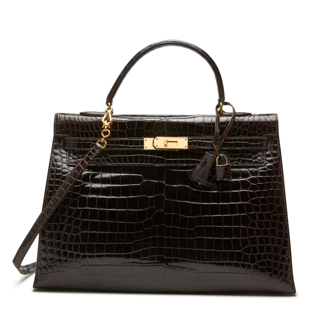 View full screen - View 1 of Lot 87. Havane Shiny Porosus Crocodile Sellier Kelly 35 Gold Hardware, 1962.