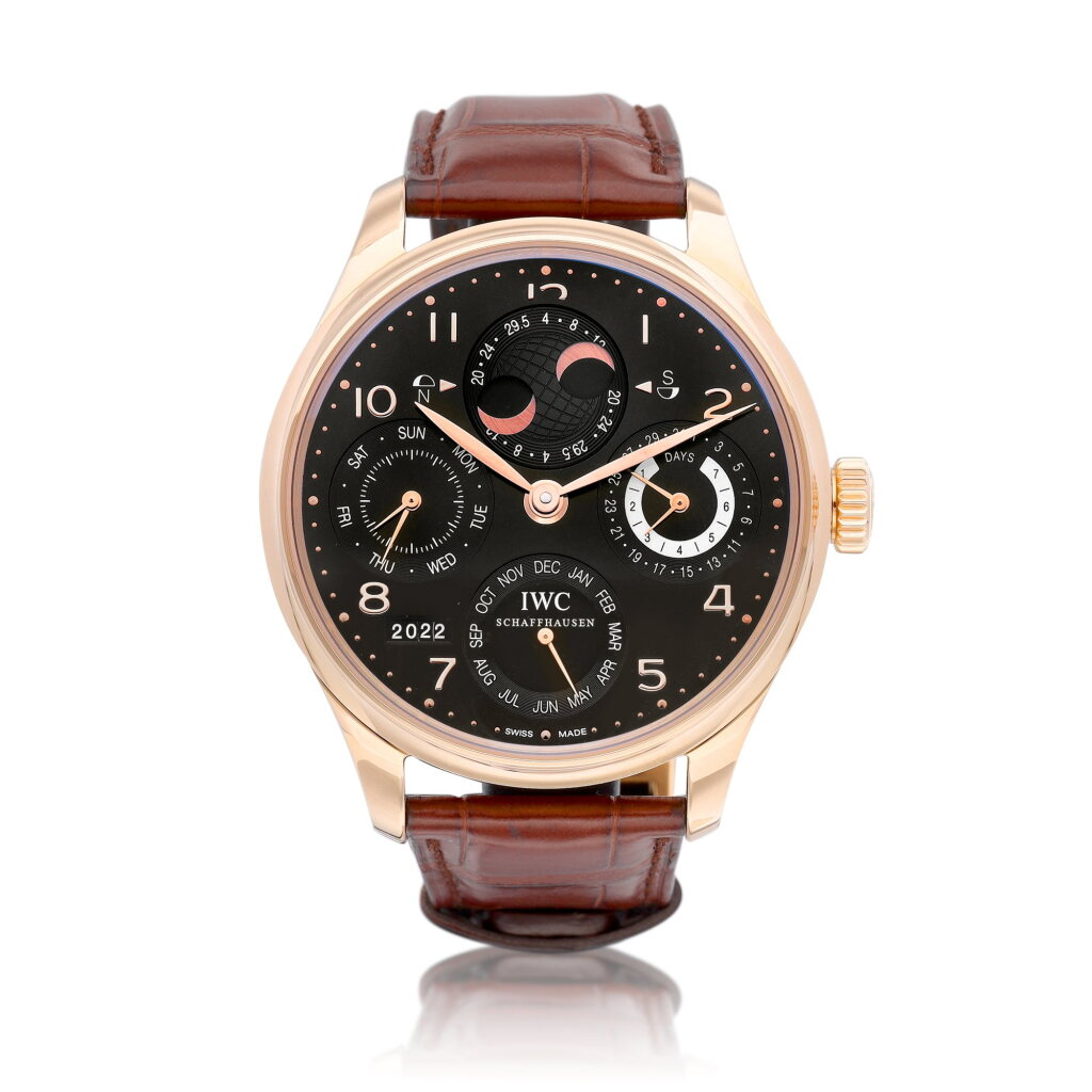 View full screen - View 1 of Lot 8133. Portugieser Perpetual Calendar, Reference IW503202 | A pink gold perpetual calendar wristwatch with day, date, perpetual moon phases for the northern and southern hemisphere, digital year display and 7 days power reserve indication, Circa 2014 | 萬國 | 葡萄牙系列萬年曆 型號IW503202 | 粉紅金萬年曆腕錶,備日期、星期、南北半球萬年曆月相、數位年份及7天動力儲備顯示,約2014年製.
