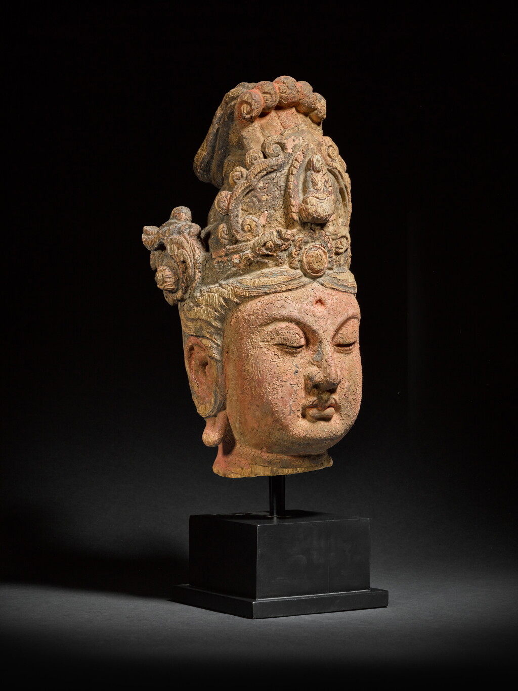 View full screen - View 1 of Lot 102. A large polychrome wood head of Avalokiteshvara, Jin / Yuan dynasty.