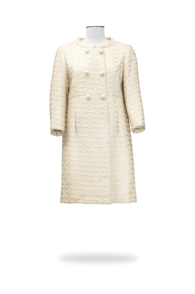 View full screen - View 1 of Lot 58. Irene Galitzine, Haute Couture, circa 1964, Boutis coat with scrollwork pattern | Manteau à petit col en boutis de soie à motifs de rinceaux.