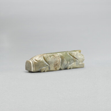 View full screen - View 1 of Lot 763. A celadon jade pig, Eastern Han dynasty | 東漢 青玉豬握.