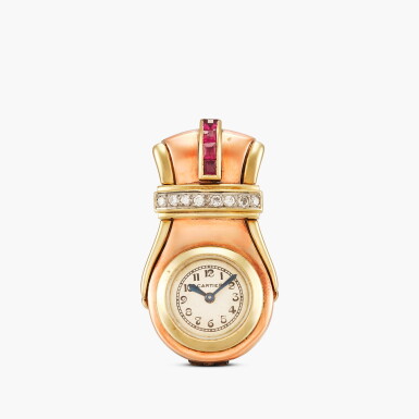 View full screen - View 1 of Lot 2229. New York retailed | Clip de Revers | A yellow and pink gold, diamond and ruby-set lyre-form clip watch, Circa 1937.