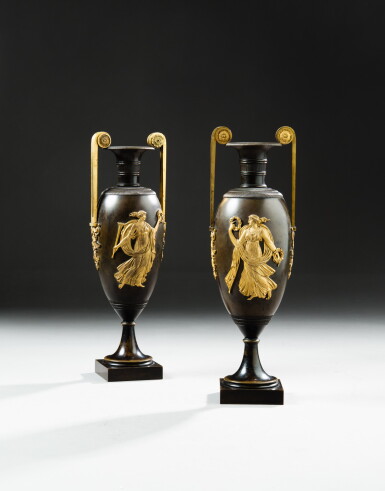 View full screen - View 1 of Lot 64. A pair of patinated and gilt-bronze vases, Empire, circa 1810, after a model of Pierre-Philippe Thomire | Paire de vases en bronze patiné et doré d'époque Empire, vers 1810, d'après un modèle de Pierre-Philippe Thomire.