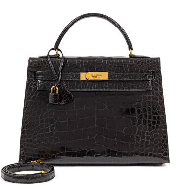 View full screen - View 1 of Lot 724. Vintage Black Shiny Mississippiensis Alligator Kelly 32 Sellier Gold Hardware, 1996.