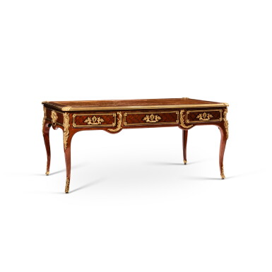 View full screen - View 1 of Lot 38. A Louis XV gilt-bronze mounted satinwood and amaranth veneered bureau plat, circa 1740, stamped by Mathieu Criaerd.