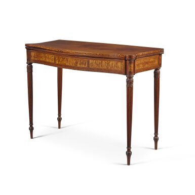 View full screen - View 1 of Lot 102. A Very Fine and Rare Federal Carved and Inlaid Figured Mahogany, Maple and Birchwood Serpentine-Front Games Table, Attributed to John Seymour (1738–1818) and/or Thomas Seymour (1771–1848), Carving attributed to Thomas Wightman (1759–1827), Boston, Massachusetts, Circa 1800-1808.