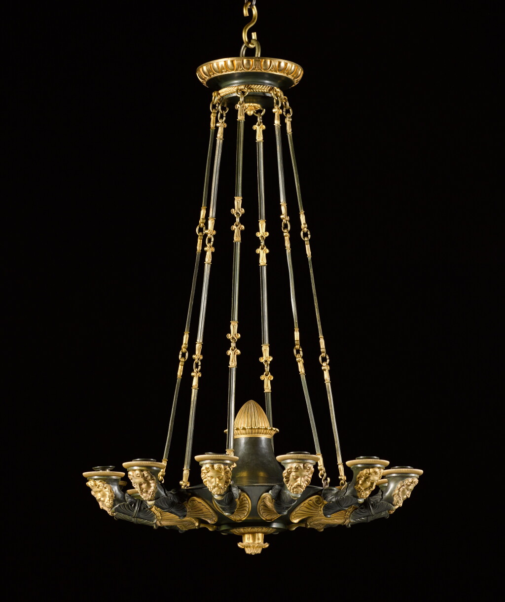 View full screen - View 1 of Lot 119. A Charles X gilt and patinated bronze twelve-light chandelier, circa 1830.