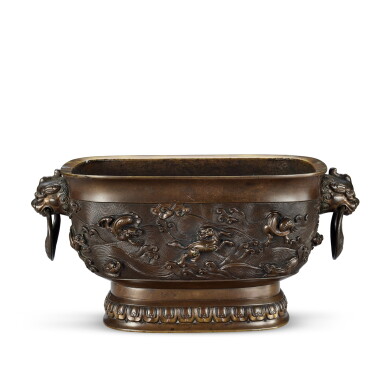 View full screen - View 1 of Lot 3694. A bronze 'mythical beast' incense burner Xuande mark, 17th century | 十七世紀 銅海獸雙鋪首活環耳爐 《大明宣德年製》仿款.