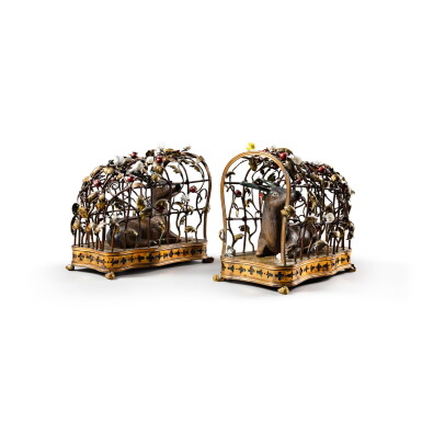 View full screen - View 1 of Lot 22. A pair of Chinese porcelain deers, first half of 18th century within a Louis XV gilt-brass latticework, circa 1750 | Paire de daguets en porcelaine, Chine première moitié du XVIIe siècle, sous un dais de treillage en cuivre verni doré d’époque Louis XV, vers 1750.